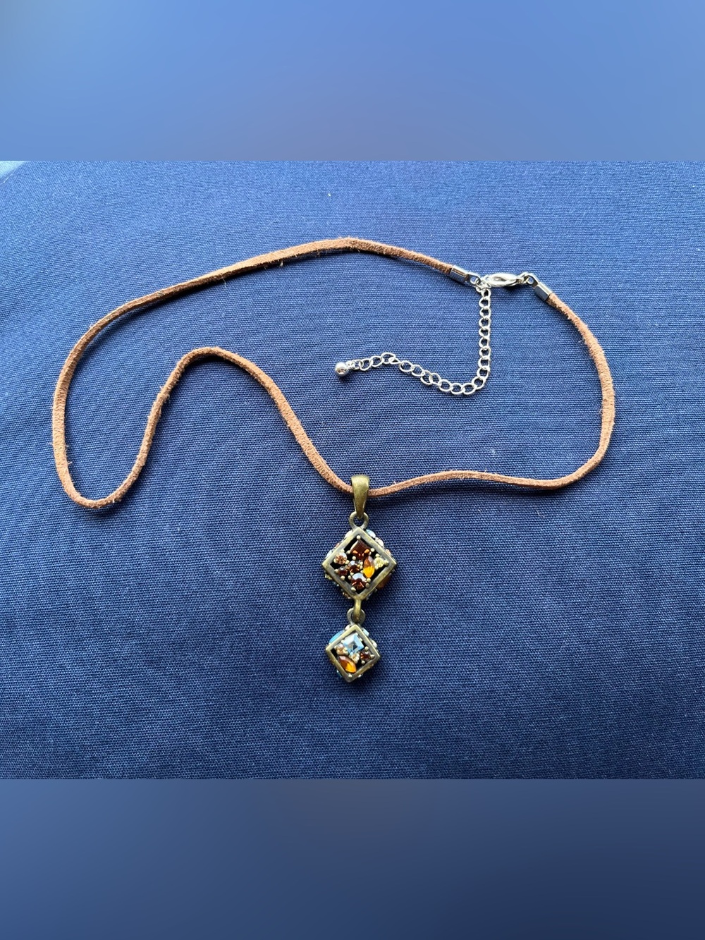 Lia Sophia Blue and Orange Multi-Stone Pendant Necklace on Leather Strap